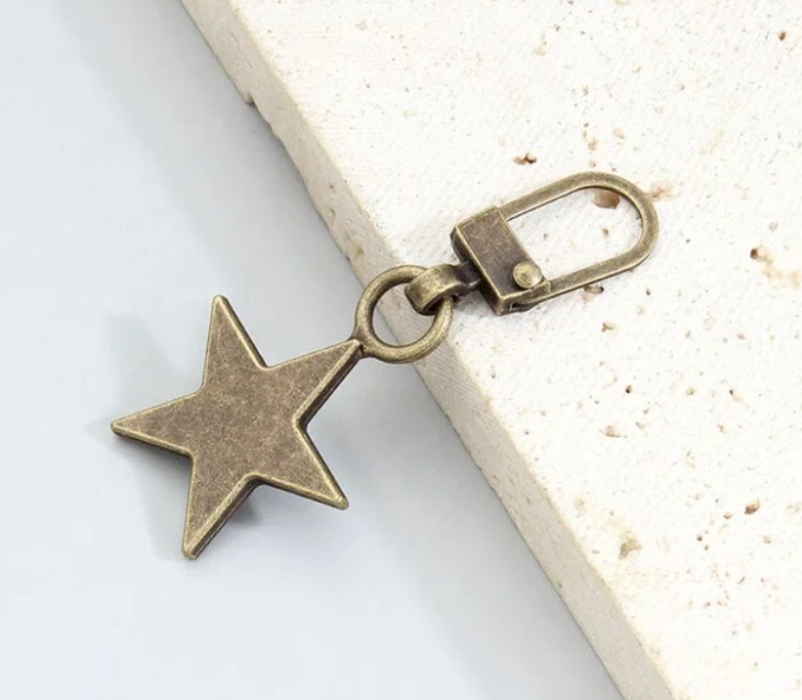 Tête de curseur métallique étoile pour fermeture nylon 5mm - Couleur bronze